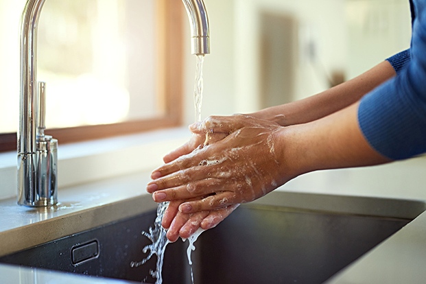 Is it better to use hot or cold water to wash your hands?